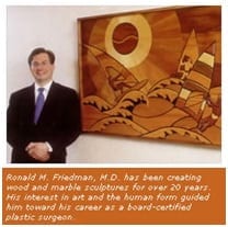 Dr. Friedman with a piece of art